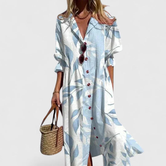 Boho dress featuring vibrant patterns and a flattering fit, made from lightweight fabric, perfect for casual and special occasions. 1