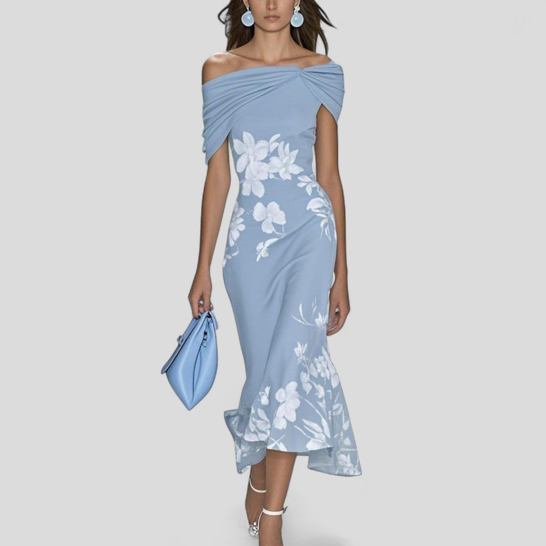 Floral midi dress for women featuring a relaxed silhouette, unique print, and soft breathable fabric, perfect for casual outings and summer events. 1