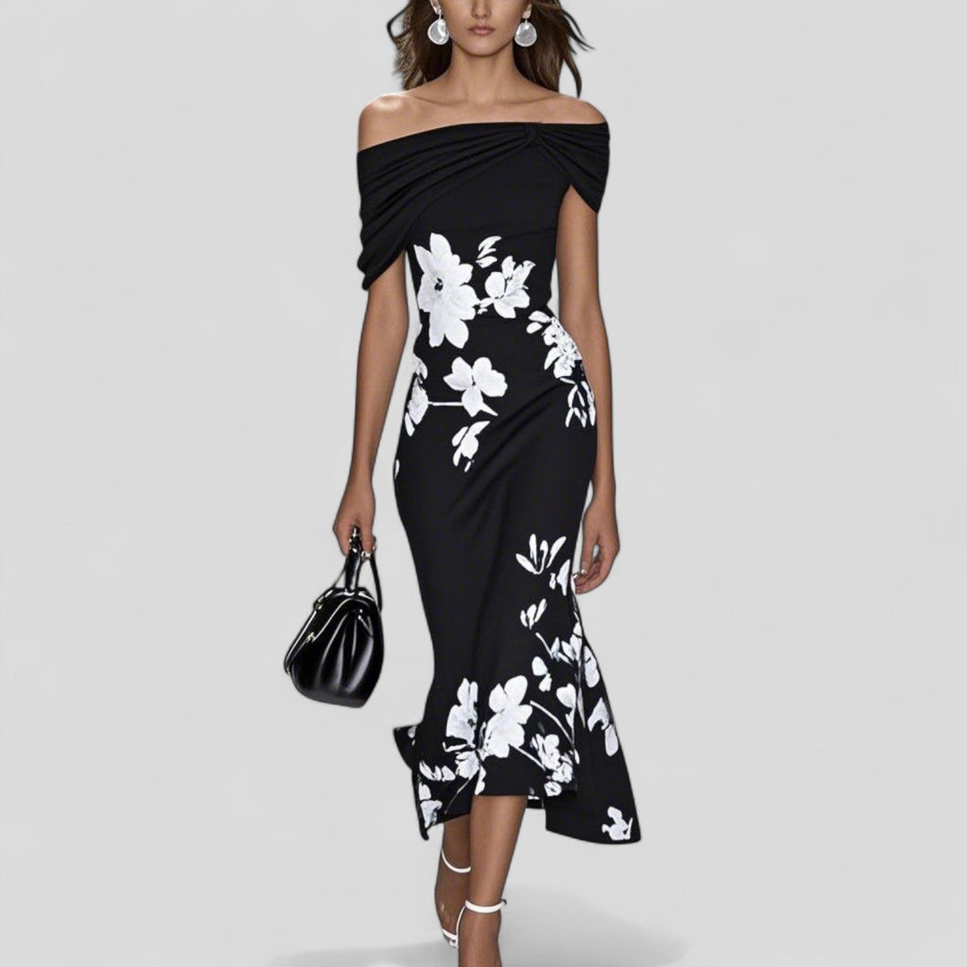 Floral midi dress for women featuring a relaxed silhouette, unique print, and soft breathable fabric, perfect for casual outings and summer events. 2