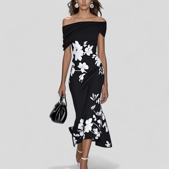 Floral midi dress for women featuring a relaxed silhouette, unique print, and soft breathable fabric, perfect for casual outings and summer events. 2