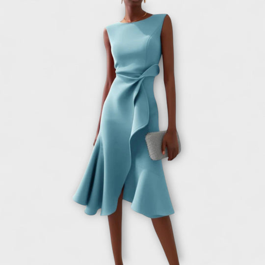 Elegant sleeveless midi dress featuring a unique asymmetric detail, perfect for chic occasions and flattering all body types. 4