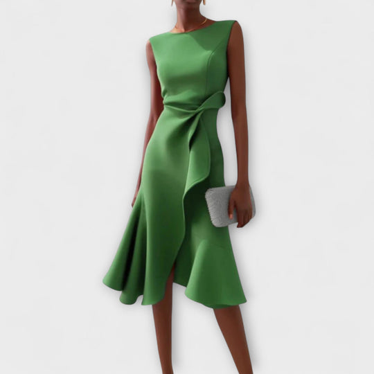 Elegant sleeveless midi dress featuring a unique asymmetric detail, perfect for chic occasions and flattering all body types. 6