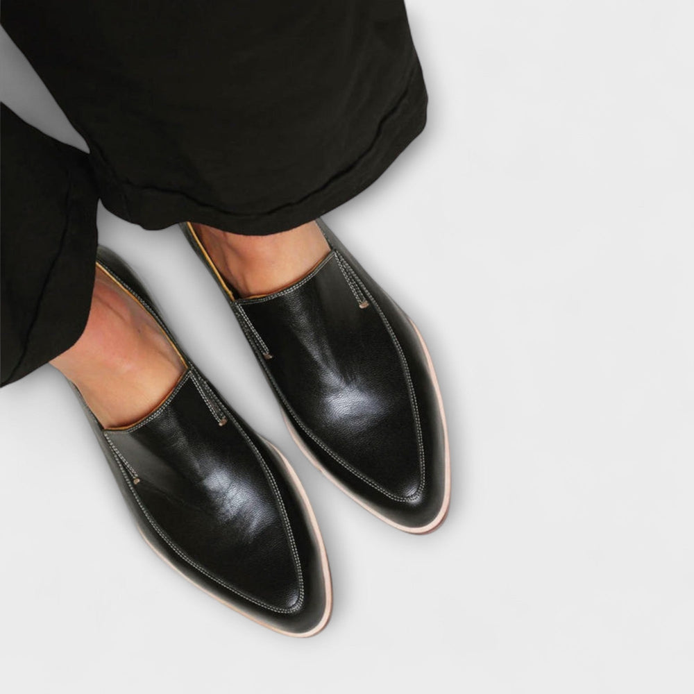 Orthopedic loafers for women featuring a classic leather design, available in multiple colors, providing all-day comfort and support. 1