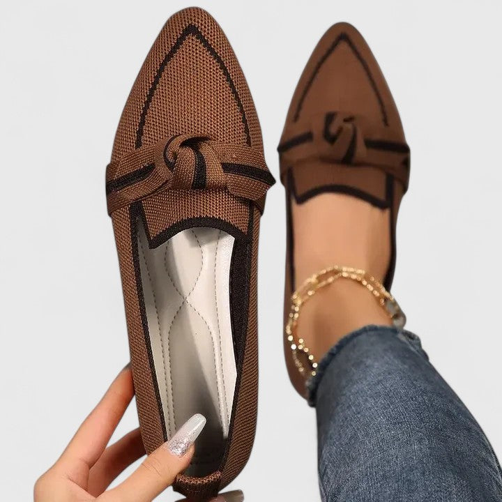 Orthopedic loafers for women in a sleek black design, featuring superior arch support and shock-absorbing cushioning for all-day comfort and style. 2