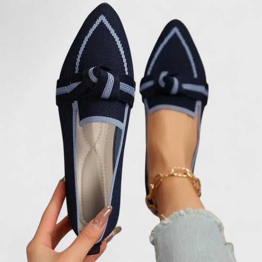 Orthopedic loafers for women in a sleek black design, featuring superior arch support and shock-absorbing cushioning for all-day comfort and style. 4