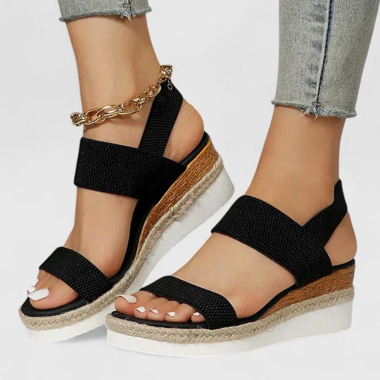 Orthopedic sandals for women featuring enhanced arch support and cushioning, designed for maximum comfort and pain relief. 1