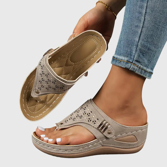 Orthopedic sandals for women featuring a shock-absorbing sole and a convenient slip-on design, providing ergonomic support and ultimate comfort for all-day wear. 3