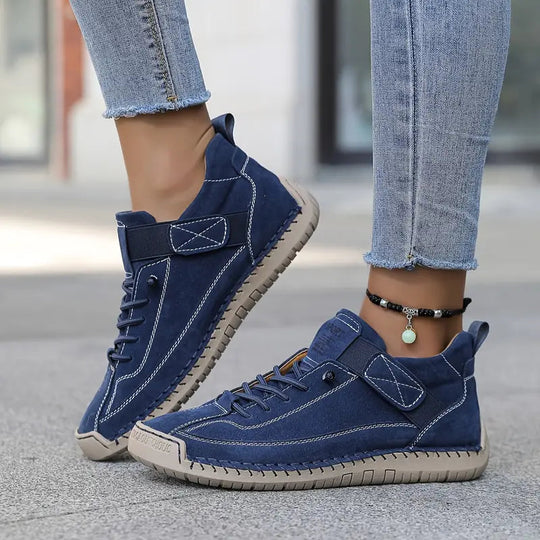 Orthopedic sneakers featuring a shock-absorbing insole, wide fit design, and breathable premium leather for optimal comfort and support. 4