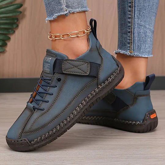 Orthopedic sneakers featuring a shock-absorbing insole, wide fit design, and breathable premium leather for optimal comfort and support. 5