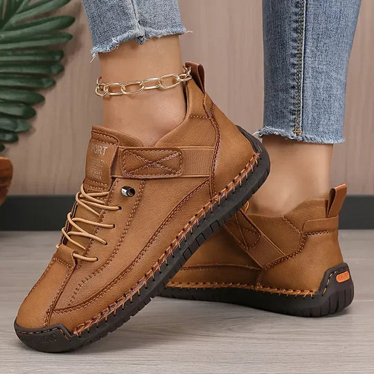 Orthopedic sneakers featuring a shock-absorbing insole, wide fit design, and breathable premium leather for optimal comfort and support. 9