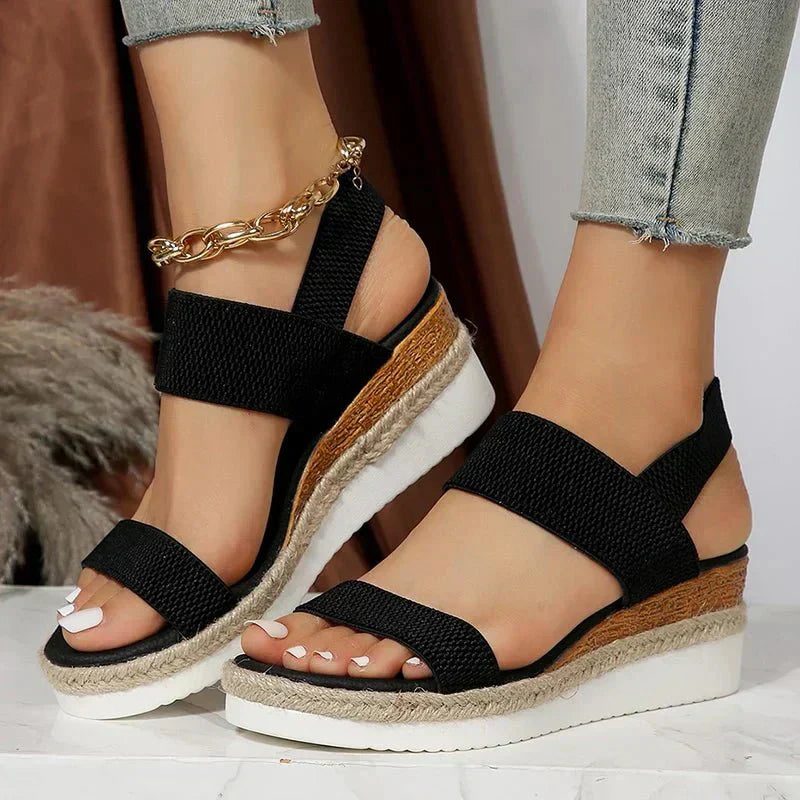 Women's platform sandals featuring elastic straps and a sporty sole, designed for lightweight comfort and breathability. Ideal for casual outings and summer wear. 4