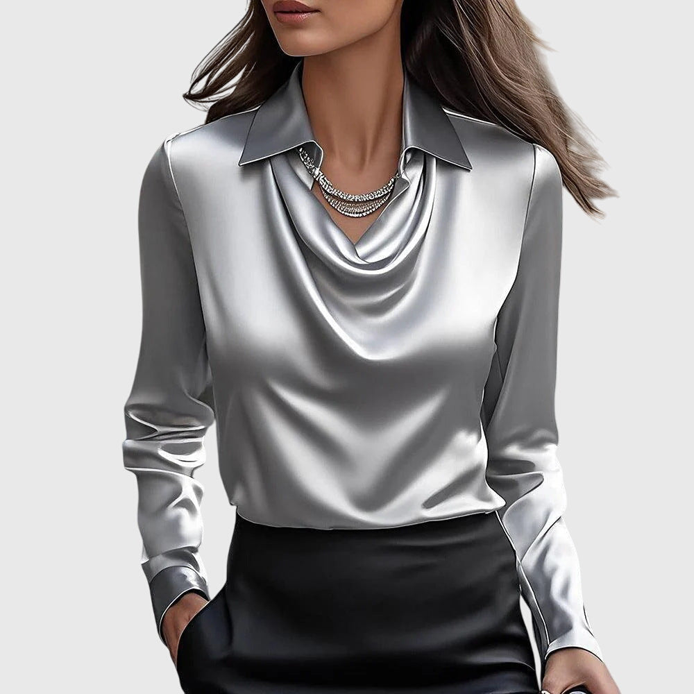 Womens blouse featuring flattering draping and a flowing fit, designed for a soft and chic versatile style, perfect for any occasion. 1