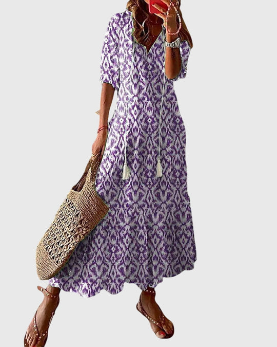 Womens Summer Boho Vintage Dress featuring a flattering V-neckline, designed for a lightweight and breezy casual style perfect for warm weather outings. 2