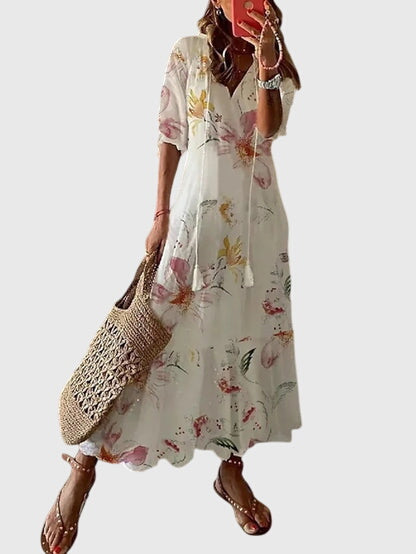 Womens Summer Boho Vintage Dress featuring a flattering V-neckline, designed for a lightweight and breezy casual style perfect for warm weather outings. 7